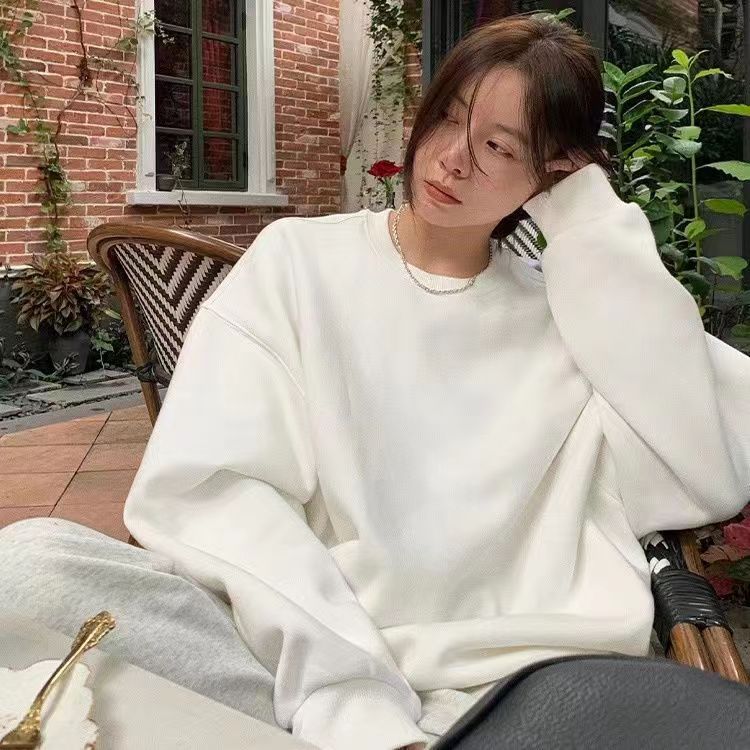 丸首の衛衣の灰色の女性の秋冬の高級感の小さい大衆のデザイン感のゆったりしている大きいサイズの純色の韓国版の怠惰な風の衛衣