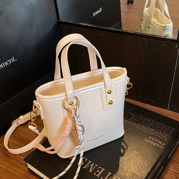 Bolso de cubo de mano para mujer 2025 nuevo estilo de comercio exterior casual bolso de hombro simple casual de viaje casual bolso de mensajero de alta calidad