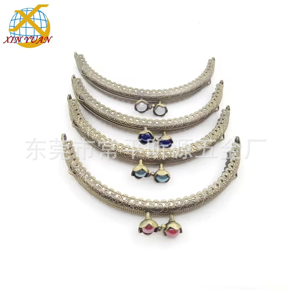 厂家销售半元卜坑莲花托珠针孔压花铁夹， 古铜色口金2款式多样