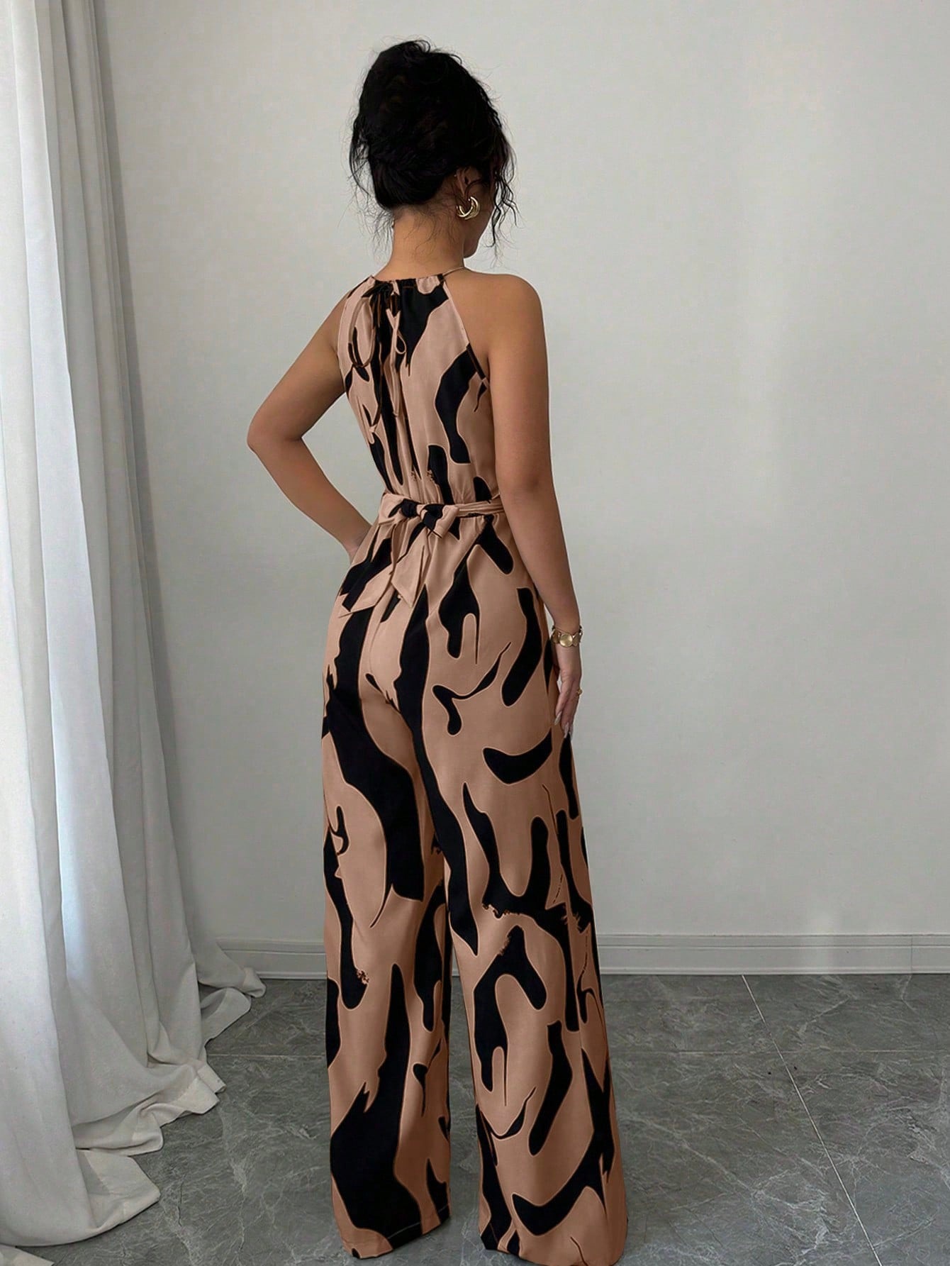 Damen Jumpsuit Mit Milch Muster Druck Halfter Ausschnitt Schwarz_voghion.com