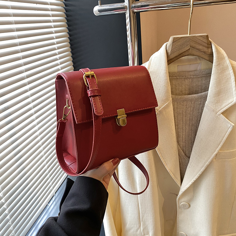 Bolsa de moda coreana para mujeres 2025 primavera nueva moda textura de bloqueo mochila de viaje simple mochila de hombro