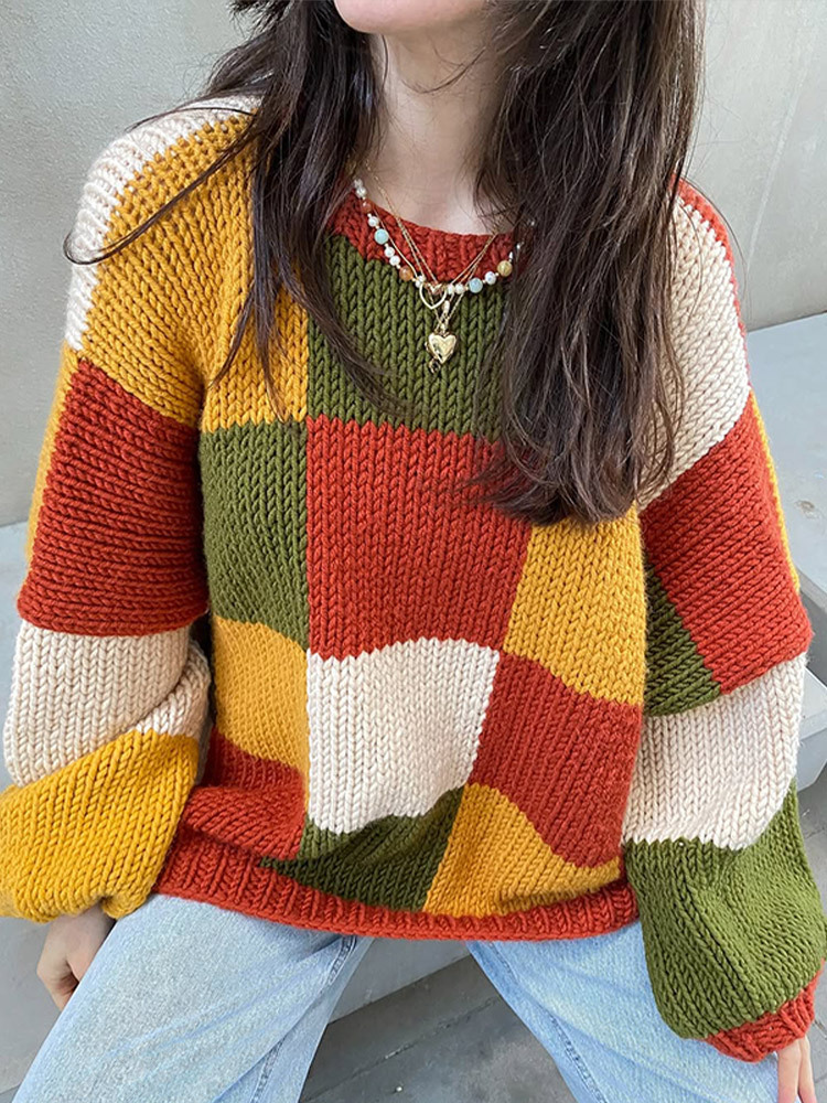 Suéter de manga larga suelta y versátil, personalidad de empalme de color contrastante para mujeres 2025, nuevo estilo de otoño y invierno transfronterizos
