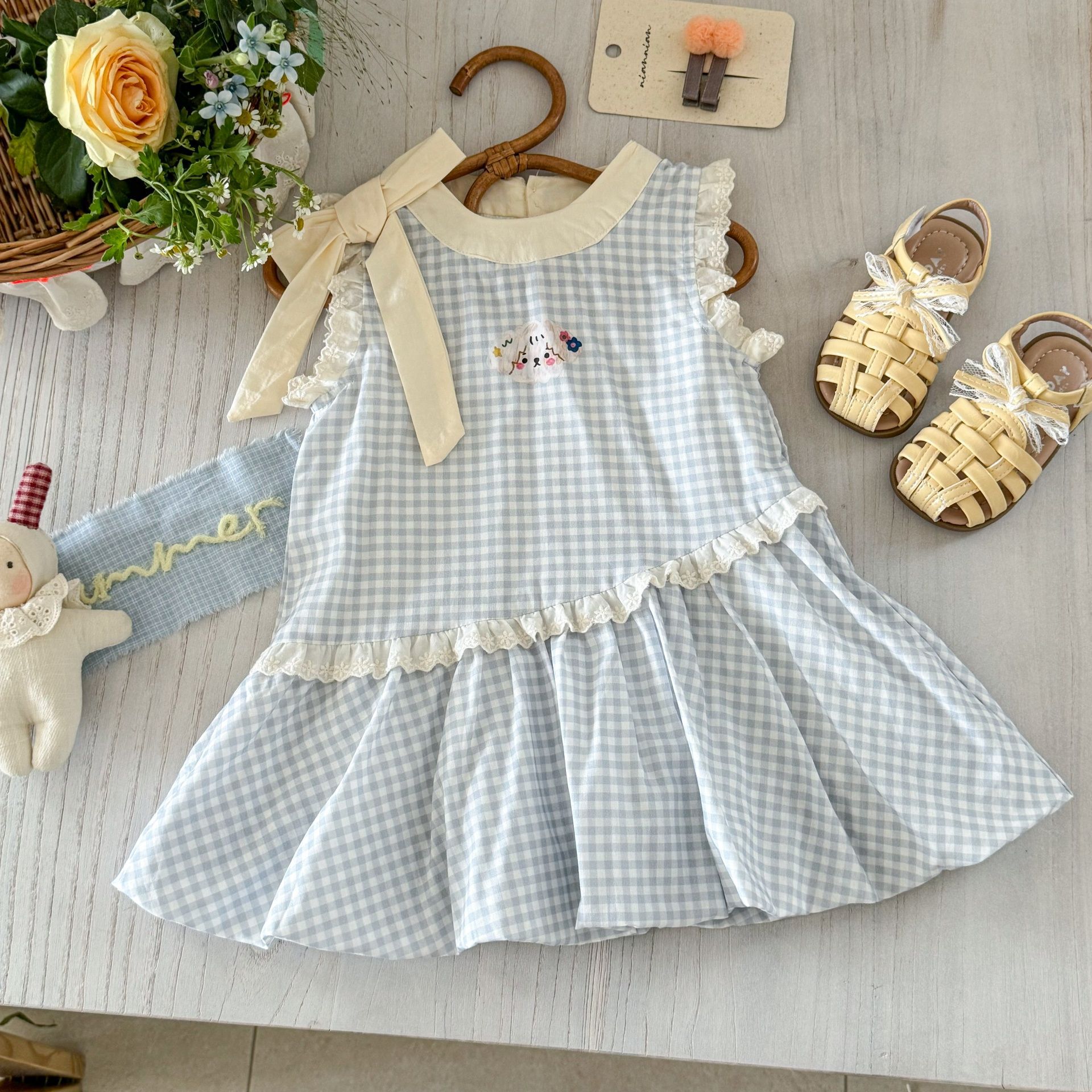 Vestido de siete niñas de limón salado verano versión coreana de dulce lazo azul a cuadros bebé lindo chaleco de capullo de flor falda de moda