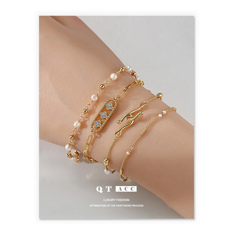 Bronce chapado en oro de 18 quilates lujoso pulsera de perlas de alta calidad joyería de perlas naturales de moda simple viento de verano nuevo