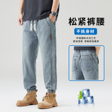 休闲运动风哈伦牛仔裤男潮牌新款百搭日常外穿宽松直筒束脚裤春夏