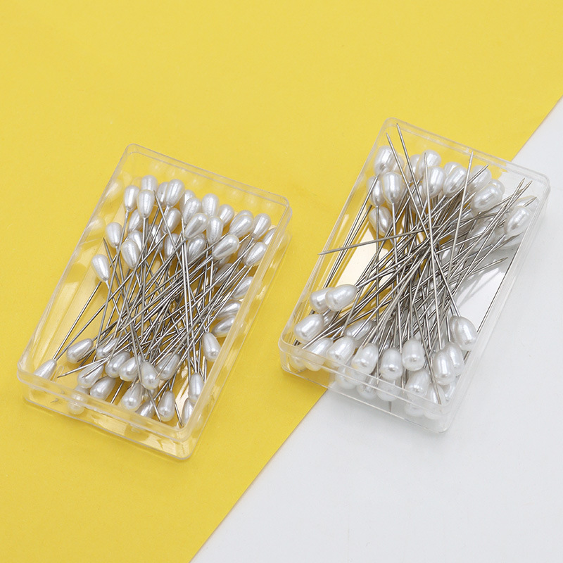 Agujas de goteo redondas de agua agujas blancas de posicionamiento de ropa de corte flores de boda fijas agujas de perlas 100