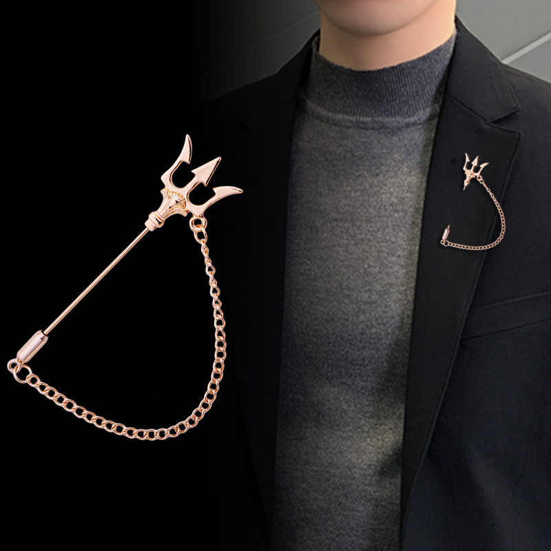 brooch with tassels