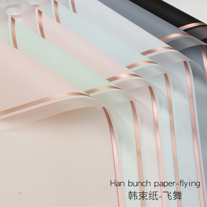 Huaxi transfronterizo Han Bundle de papel volador de película de gel de envoltura de flores impermeable florista suministros de flores papel de envoltura de ramo