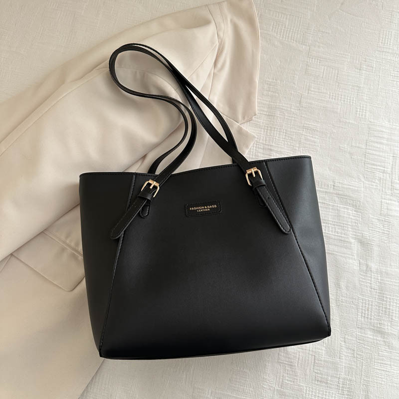 Bolsa de mano de viaje de color sólido bolsa de mano nueva alta alta capacidad axilar otoño y invierno 2024 bolsa de trabajo bolsa de mujer