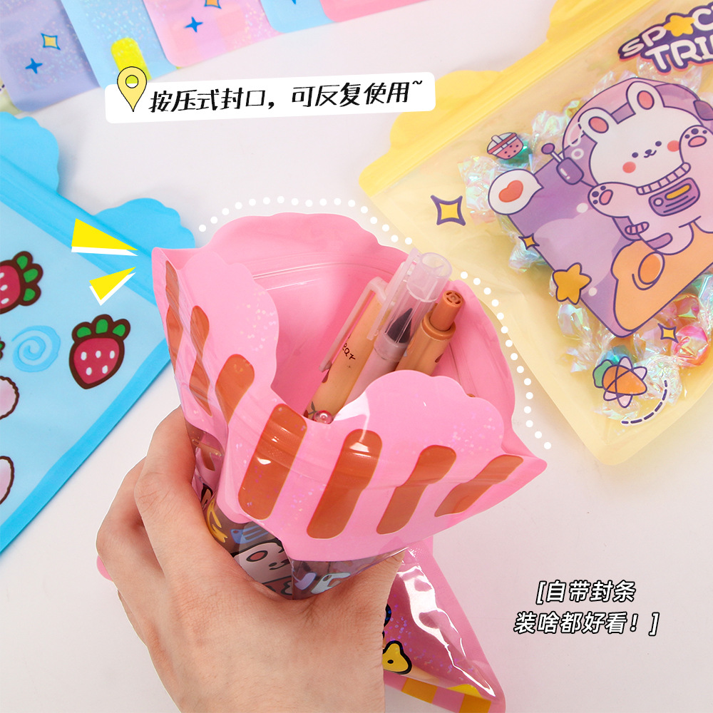 Bolsa de sello láser especial de dibujos animados encantadora bolsa de sellado translúcida pequeña galleta snack bolsa de embalaje de joyas