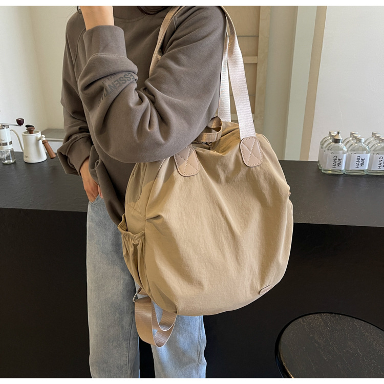 Shoulder bag women's lightweight small 2024 new travel ultra light nylon waterproof backpack for female college students_voghion.com