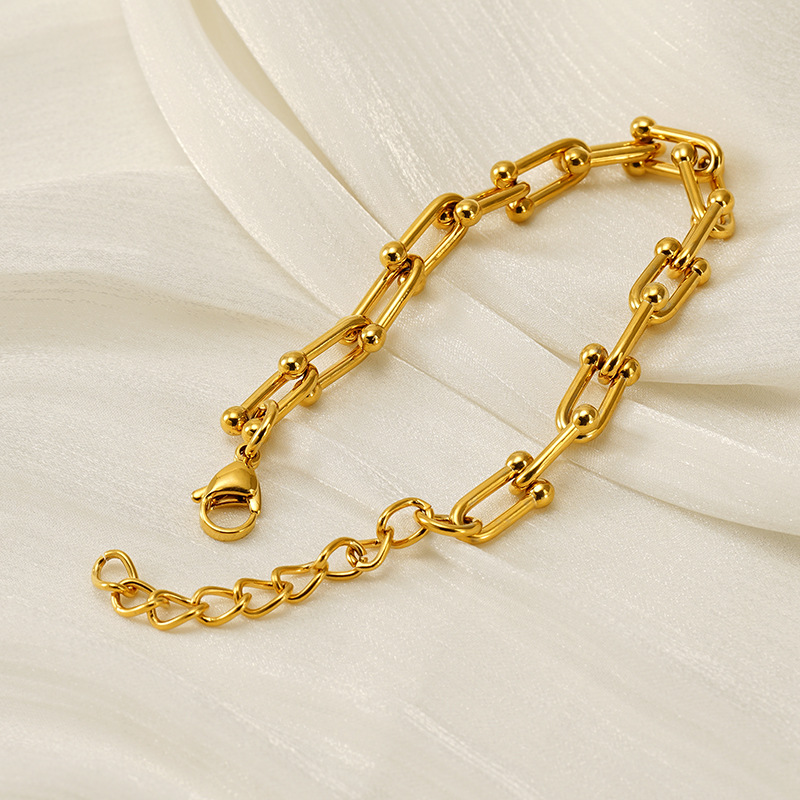 Muñeca de acero inoxidable hip-hop de moda europea y americana, diseño exagerado de acero de titanio chapado en oro, joyas de mano unisex