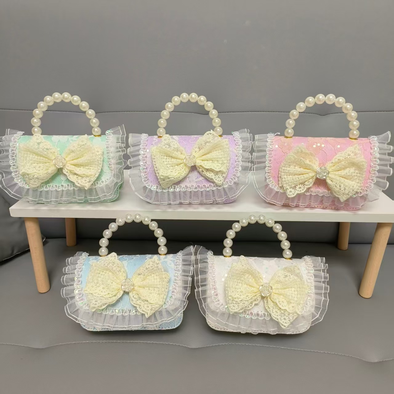 Bolso de princesa portátil de perlas, arco de encaje, bolso de hombro, bolso de cadena, bolso de cambio de Año Nuevo.