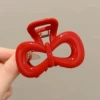 Red crab pin with bow
