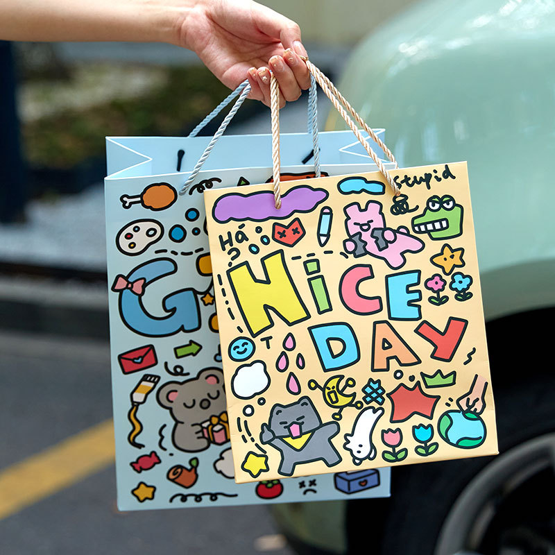 Jia Bulin Mo Ting dibujos animados bolsas de regalo serie de graffiti diario de cartas embalaje de regalo bolsa de mano