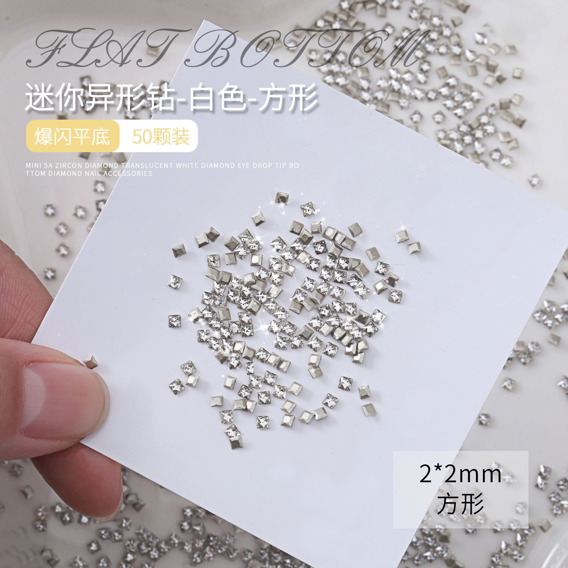 Joyería de uñas nuevo invertido mini ZIRCON diamante transparente blanco intermitente caballo ojo gota de agua tamaño pequeño ZIRCON decoración de uñas