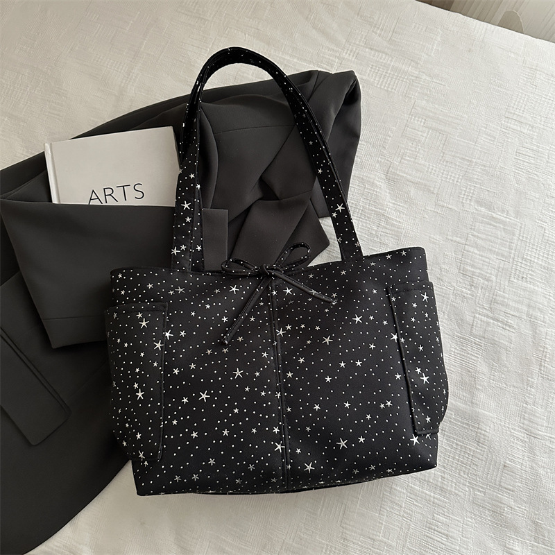 2026 nuevo estilo coreano de impresión de estrellas bolsos de mujer bolsos de gran capacidad de viaje bolsos de hombro de moda bolsos de brazo portátiles