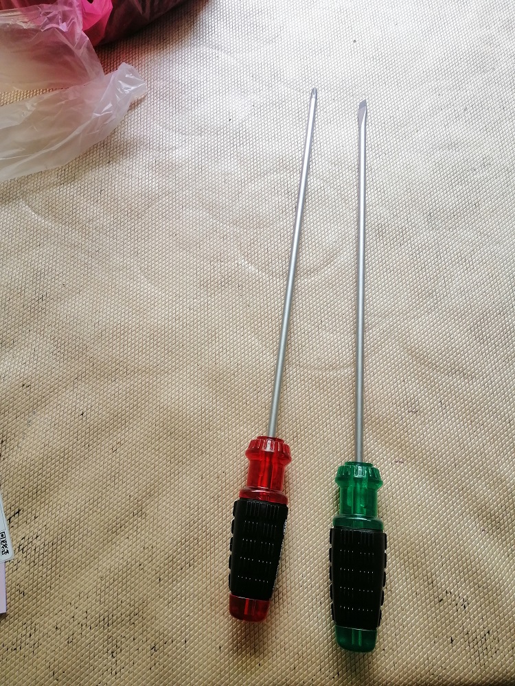 Un destornillador de flores de ciruela en una palabra especial para la máquina de coser de reparación de gran tamaño con mango extra largo largo.