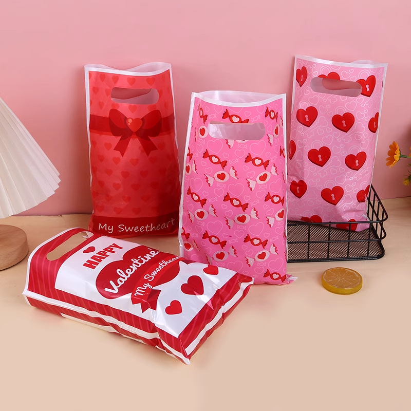 现货爱心混装手提塑料袋精品店时尚包装袋首饰袜子购物袋100个装