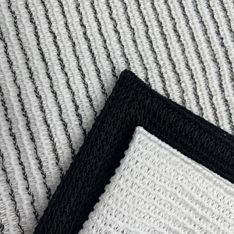 现货供应辛苦色织网布 涤纶网布 有黑色 有白色 也有黑白服装面料