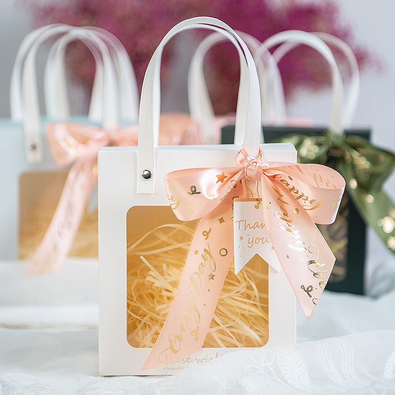 Bolsa de papel de ventana al por mayor estilo ins bolsa de papel de tamaño pequeño bolso de regalo de mano bolso de regalo transparente bolsa de regalo de tarjeta blanca