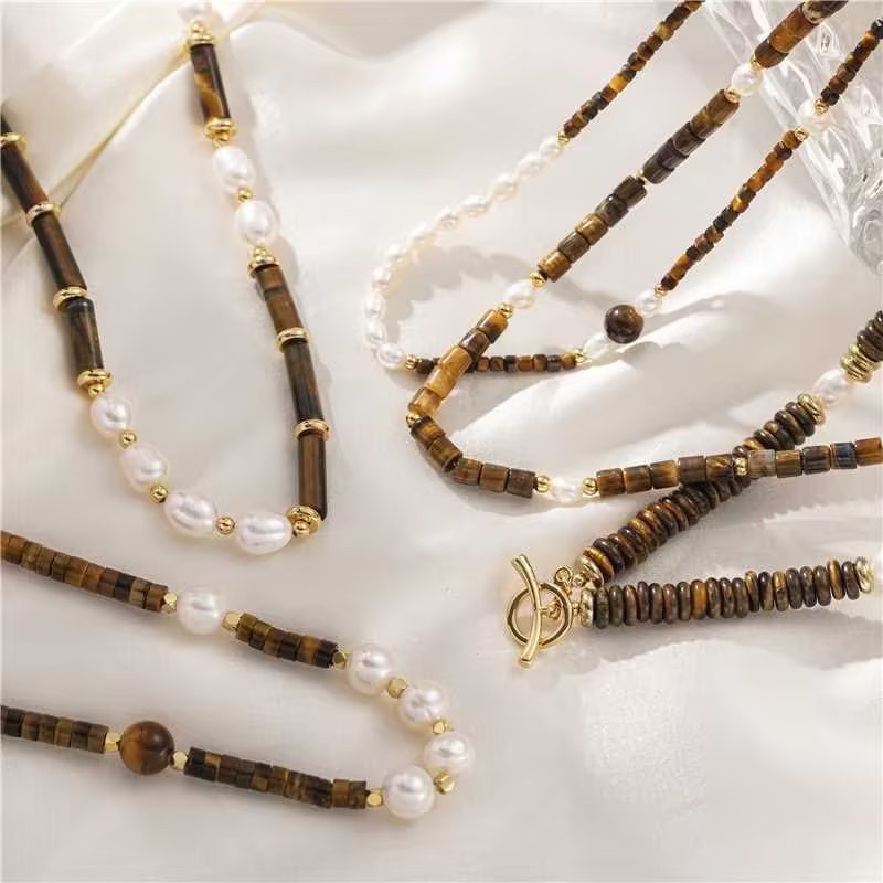 Europa y América retro langosta collar de piedra de ojo de tigre sensación de alto nivel de moda versátil no se desvanece nicho collar de perlas verdaderas mujeres