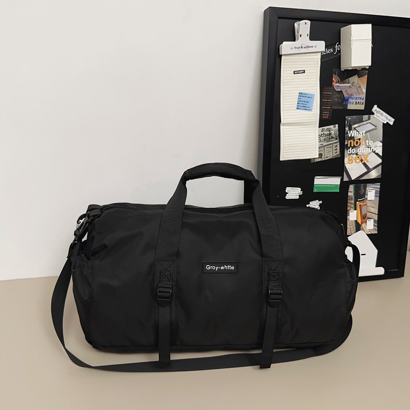 Nueva bolsa de equipaje simple negra de gran capacidad portátil bolsa de viaje corto 2024 bolsa deportiva de ocio para hombres