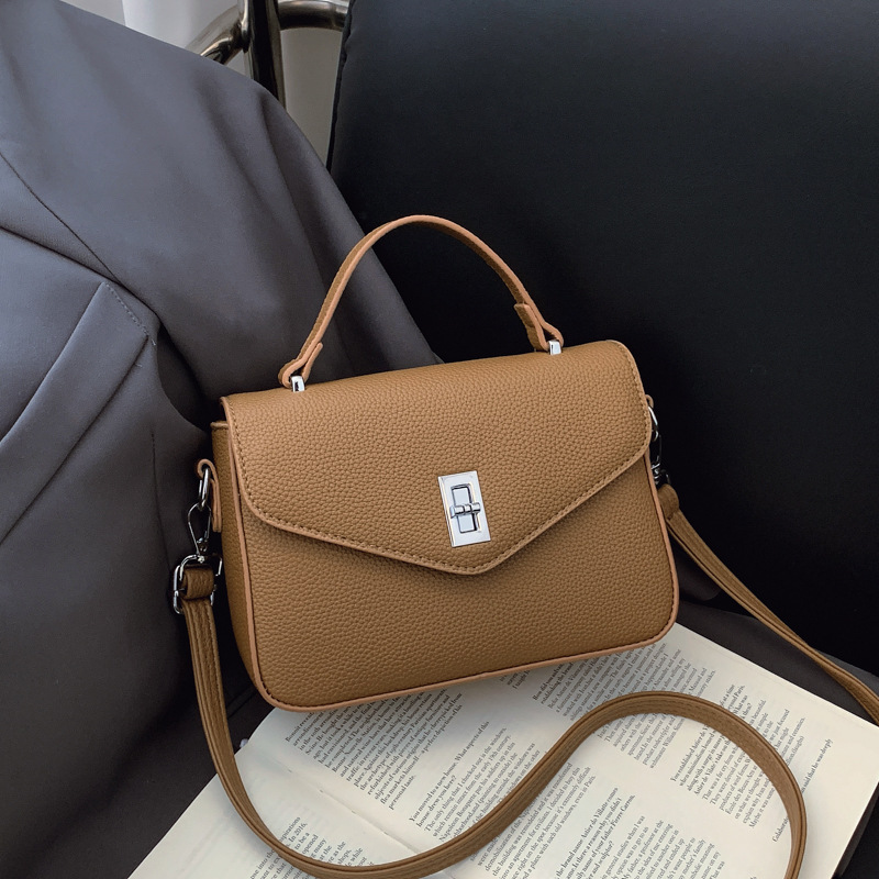 Bolso de moda coreano 2025 primavera y verano nuevo bolso femenino casual con patrón de lichi bolso de hombro simple bolso de mensajero de viaje