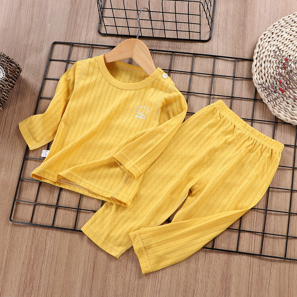 Ropa de hogar para niños ropa de hogar para bebés delgada sin hueso de algodón conjunto de pijamas al por mayor personalizado pro-piel manga corta