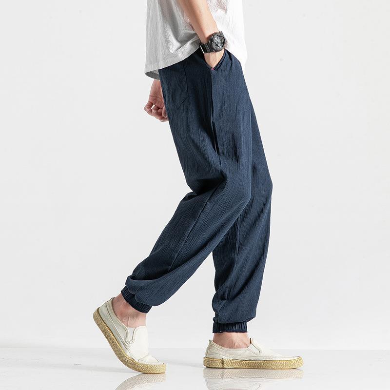 Verano 2021 estilo coreano estilo chino lino fino pantalones casuales pantalones de hombre tappered pantalones sueltos