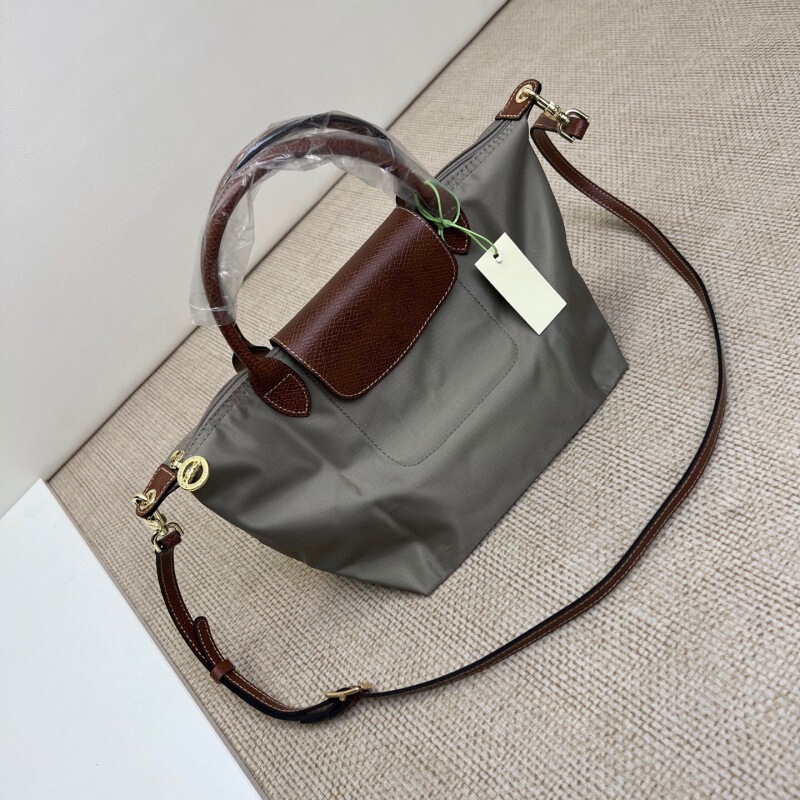 高品質の新しいショートハンドルの小さなハンドバッグ、女性用シングルショルダー、長いストラップ付き、パンチングクロスボディバッグ、ナイロン餃子バッグ|undefined