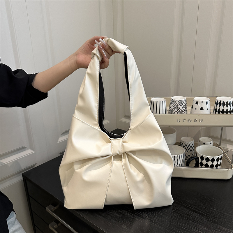 Fashionable denim sophisticated shoulder bag with bow