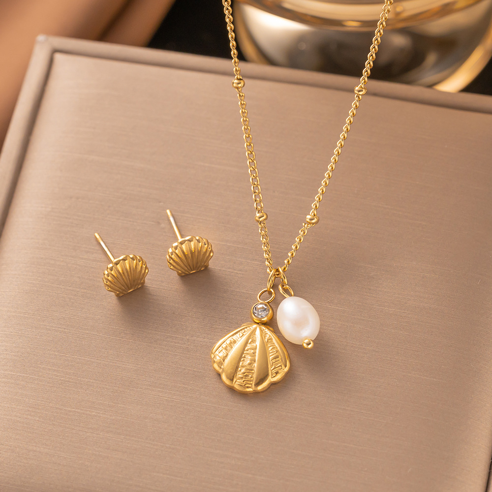 Juego de joyería de acero de titanio 2023 – collar, aretes, de alta gama, venta al por mayor
