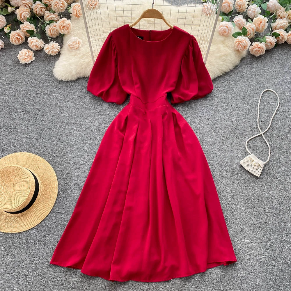 Пузырь с короткими рукавами и молнией с открытой спиной