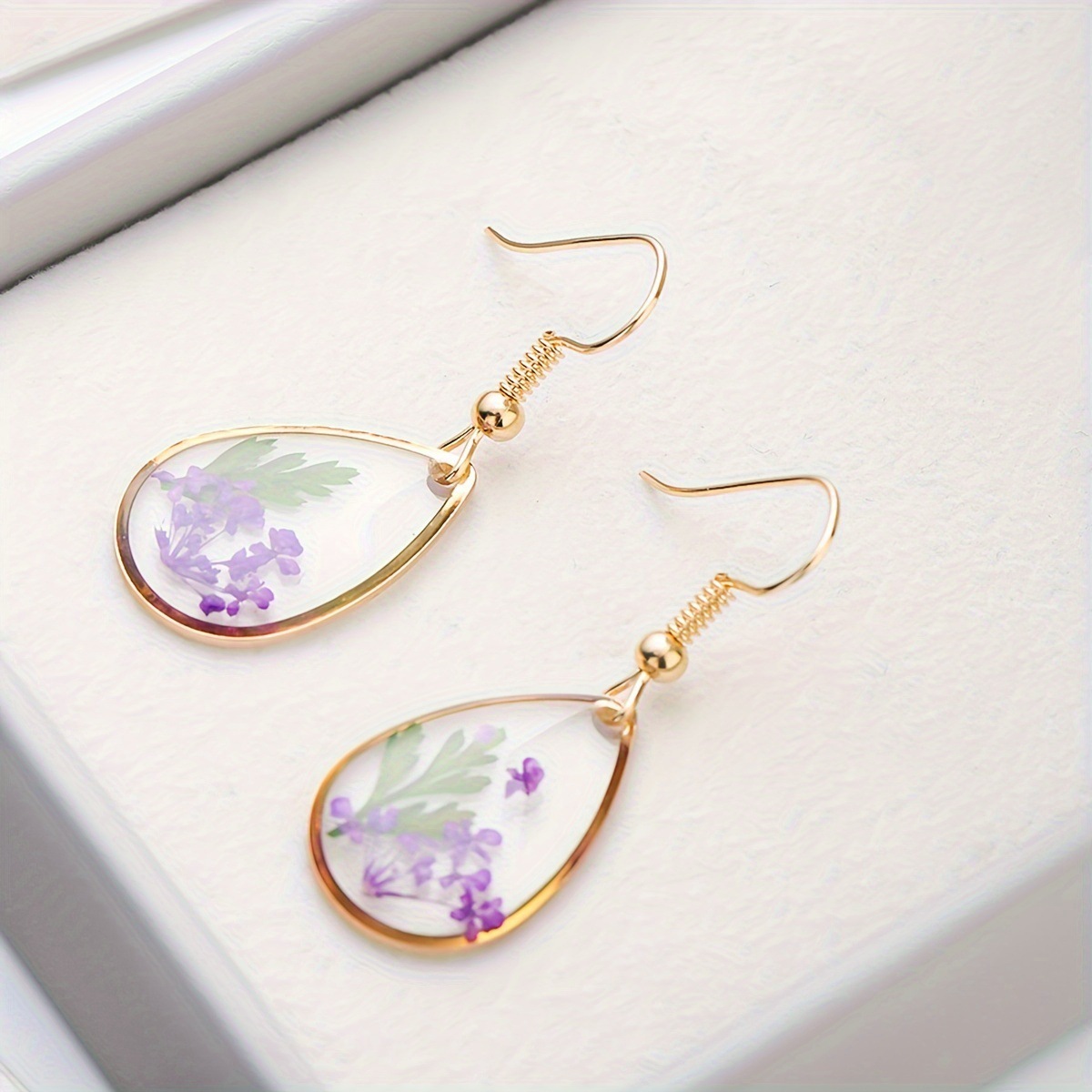 Gancho de oreja de flor seca de flor real para mujer nuevo temperamento de moda Pendientes de lujo ligero de alta gama estilo ins pendientes de moda simples y versátiles