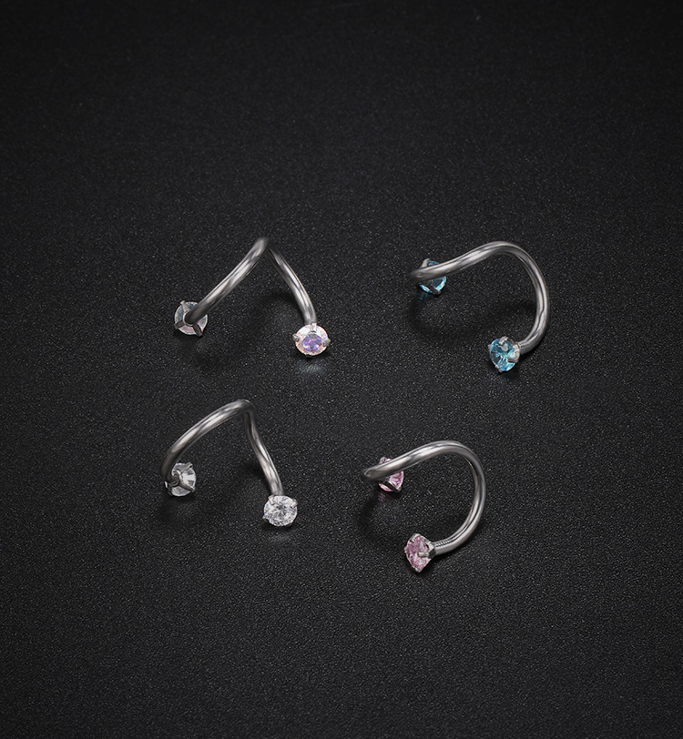 Silver pointed spike labret stud material detail