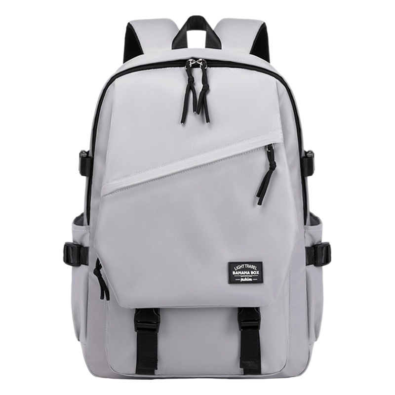 Suministro transfronterizo mochila de viaje al aire libre Junior High School College schoolbag moda simple ligero Oxford Mochila de tela