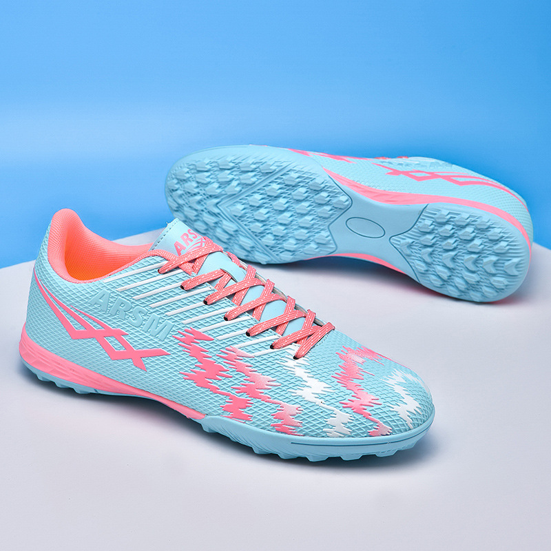 Comercio exterior transfronterizo nuevas zapatillas de fútbol deportivas bajas al aire libre para hombres y mujeres zapatillas de entrenamiento con clavos artificiales para estudiantes