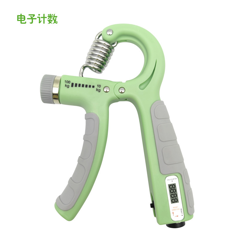 握力器は腕の男性の専門力のフィットネスの器材を練習します。|undefined