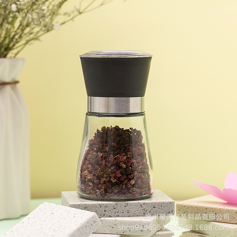 Molinillo manual transfronterizo hogar cocina botella de molienda de acero inoxidable botella de molienda de grano de pimienta negra botella esparcidora ultrafina