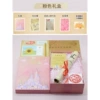 A big newspaper + pink gift box