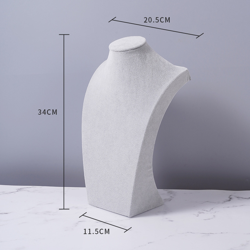 フランネルのネックレスの展示棚の人はモデルのアクセサリー棚のネックレスの首の型のカウンターの陳列道具のネックレスの棚のようです。|undefined