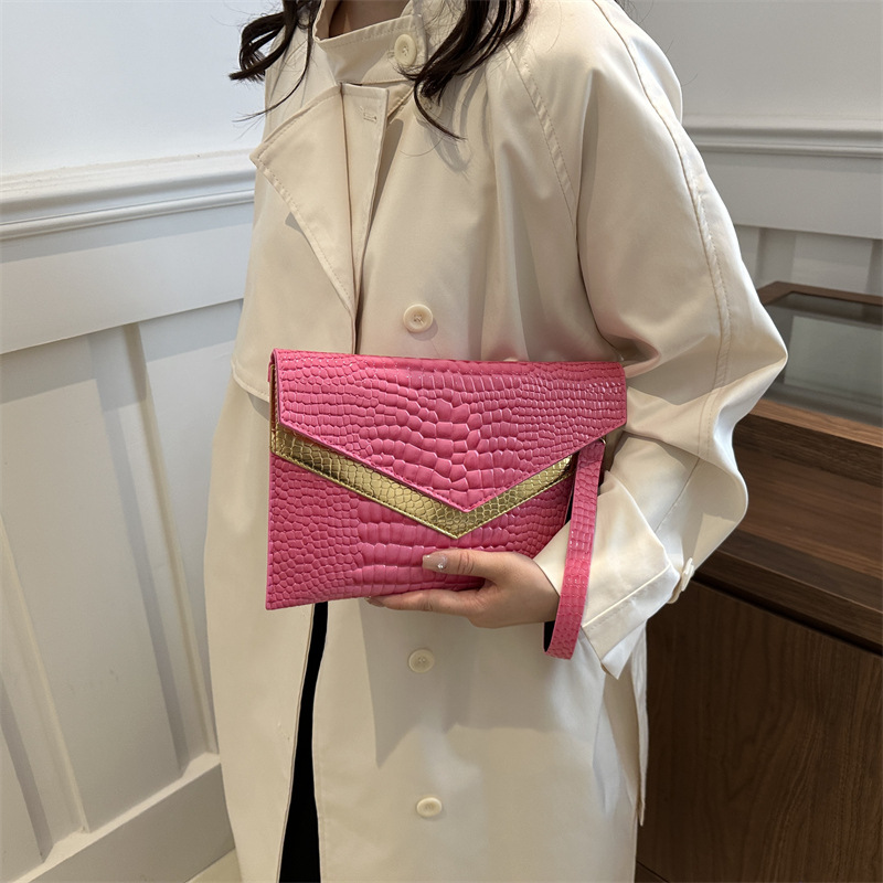 Bolso de mano sobre 2024 otoño nuevo estilo personalidad coreana moda femenina de moda temperamento casual todo-fósforo banquete pequeño bolso