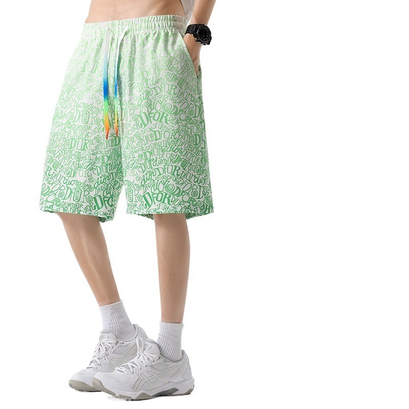 Verano nuevo estilo adolescente pantalones cortos deportivos moda casual gradiente pantalones cortos de camuflaje pantalones sueltos de playa