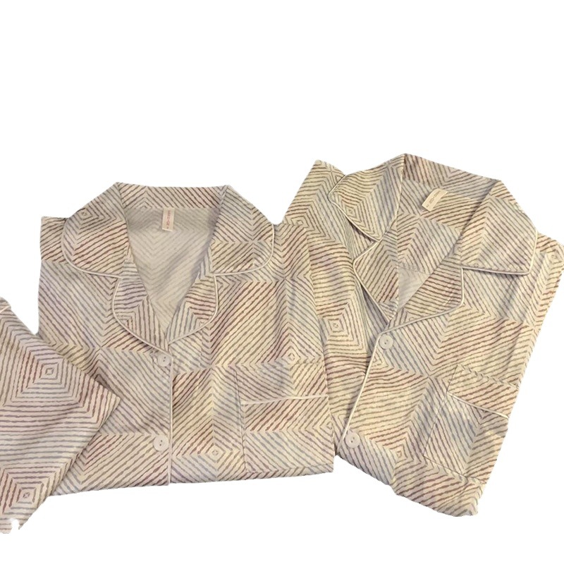 Los pijamas de primavera y otoño usan un hombre y una mujer Pantalones de manga larga de seda de hielo 2024 nuevas rayas más tamaño ropa para el hogar verano