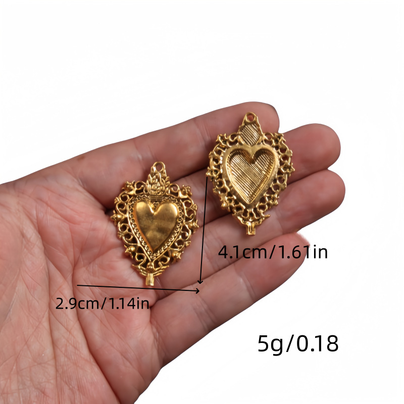 Transfronterizos 10 estilos de oro antiguo colorado colgante de aleación del corazón sagrado DIY encanto joyería accesorios metálicos