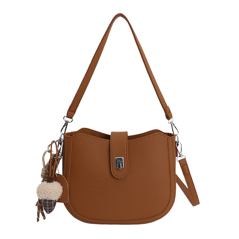 Hot sale nuevo nicho coreano litchi estampado bolso de cubo de hombro para mujeres sensación de lujo ligero versátil bolso de transporte de viaje