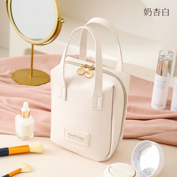 Handheld cosmetic bag