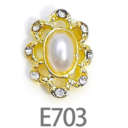 E703