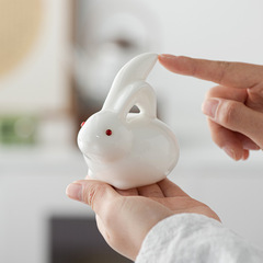 Elegant, affordable sheep-fat jade rabbit tea ornaments—cultivable, high-end, and creatively designed gifts perfect for the Rabbit Year or Mid-Autumn Festival, available wholesale.